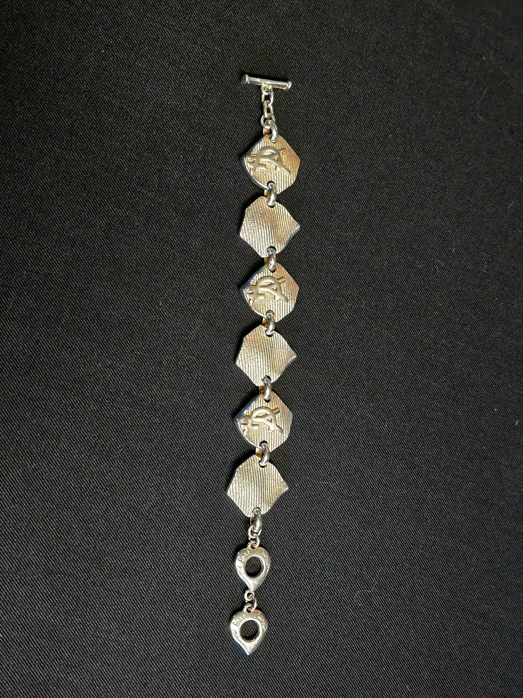 YSL bracelet métal argenté