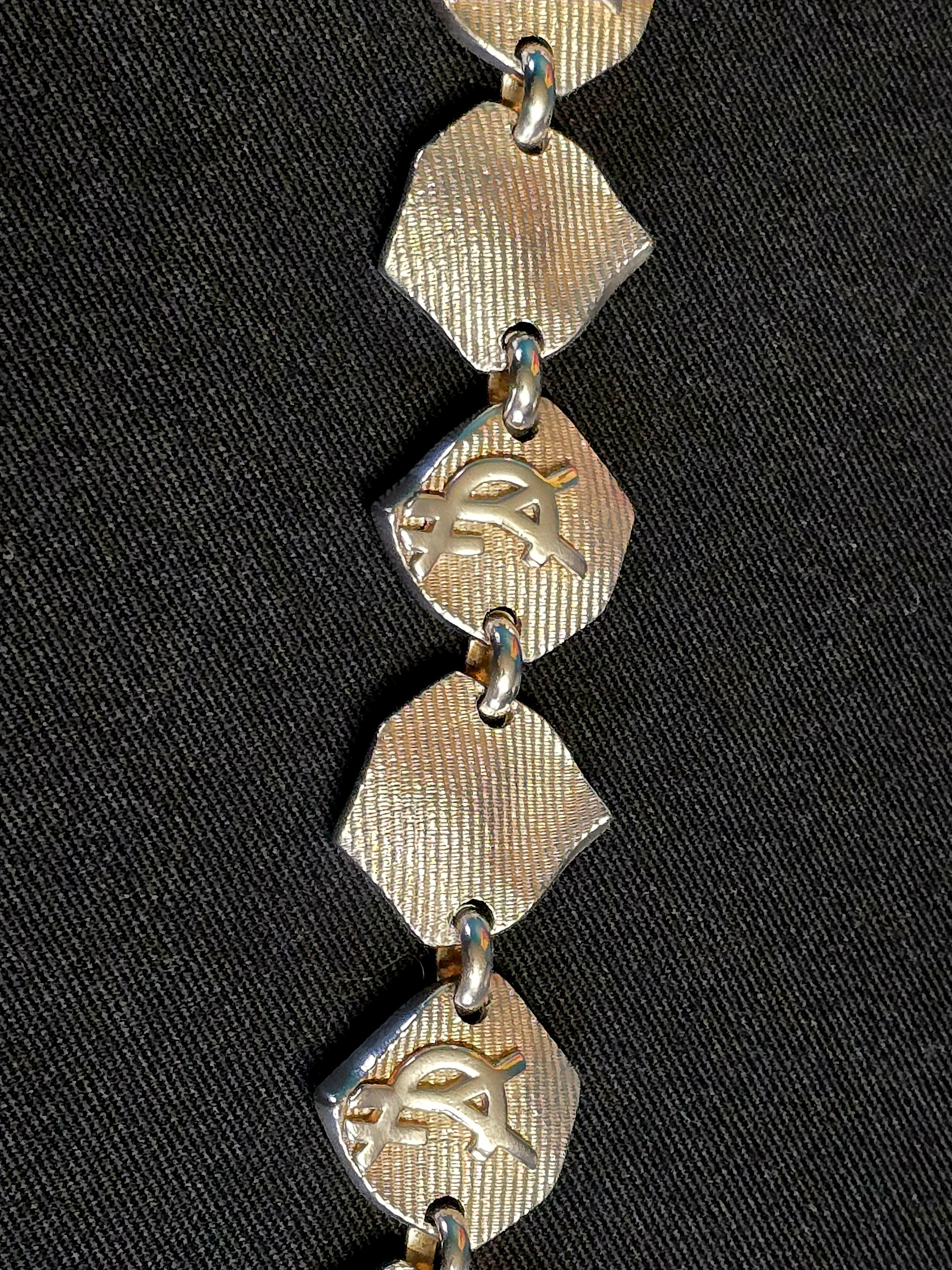 YSL bracelet métal argenté