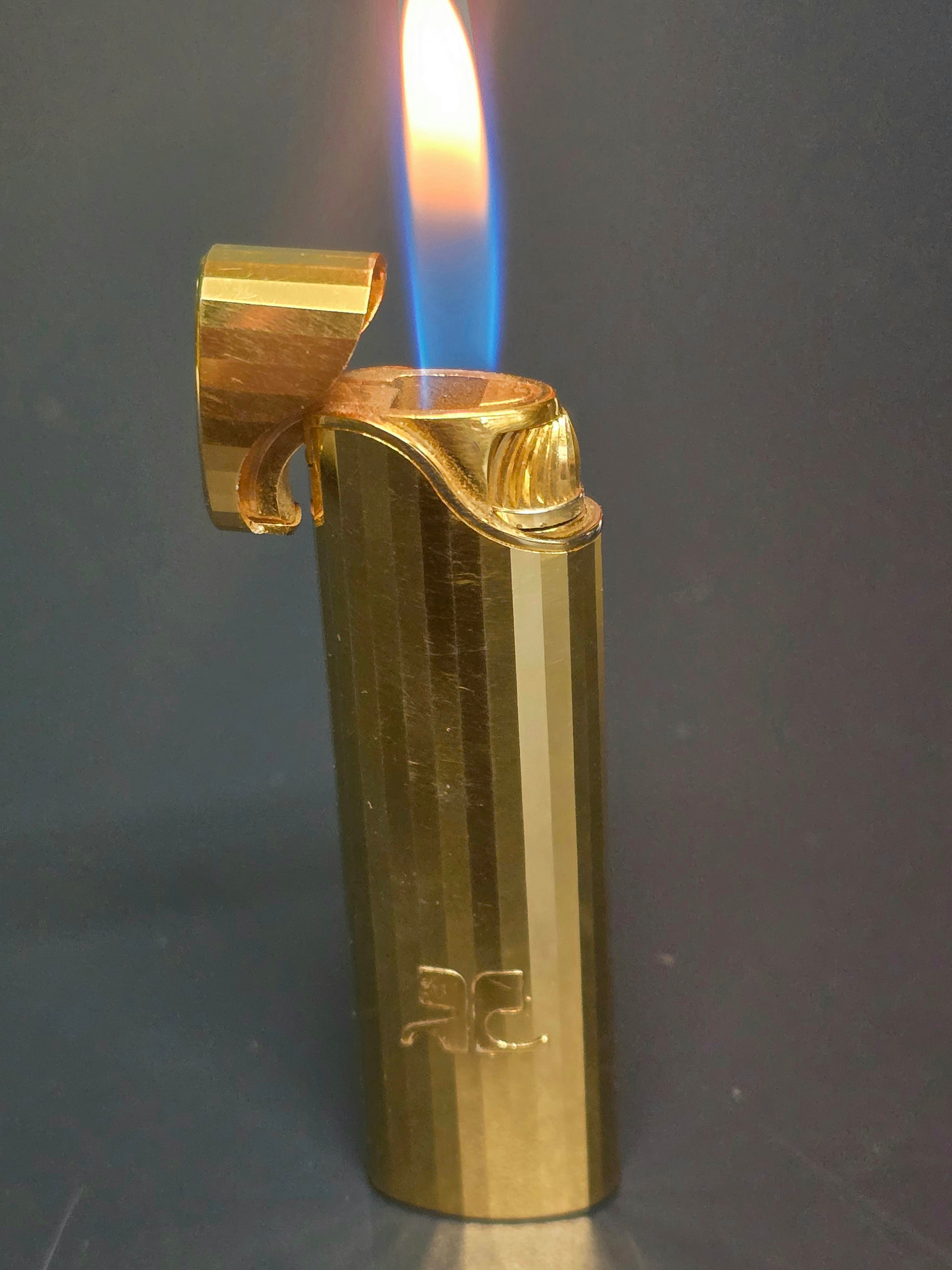 Corrèges briquet à facettes doré